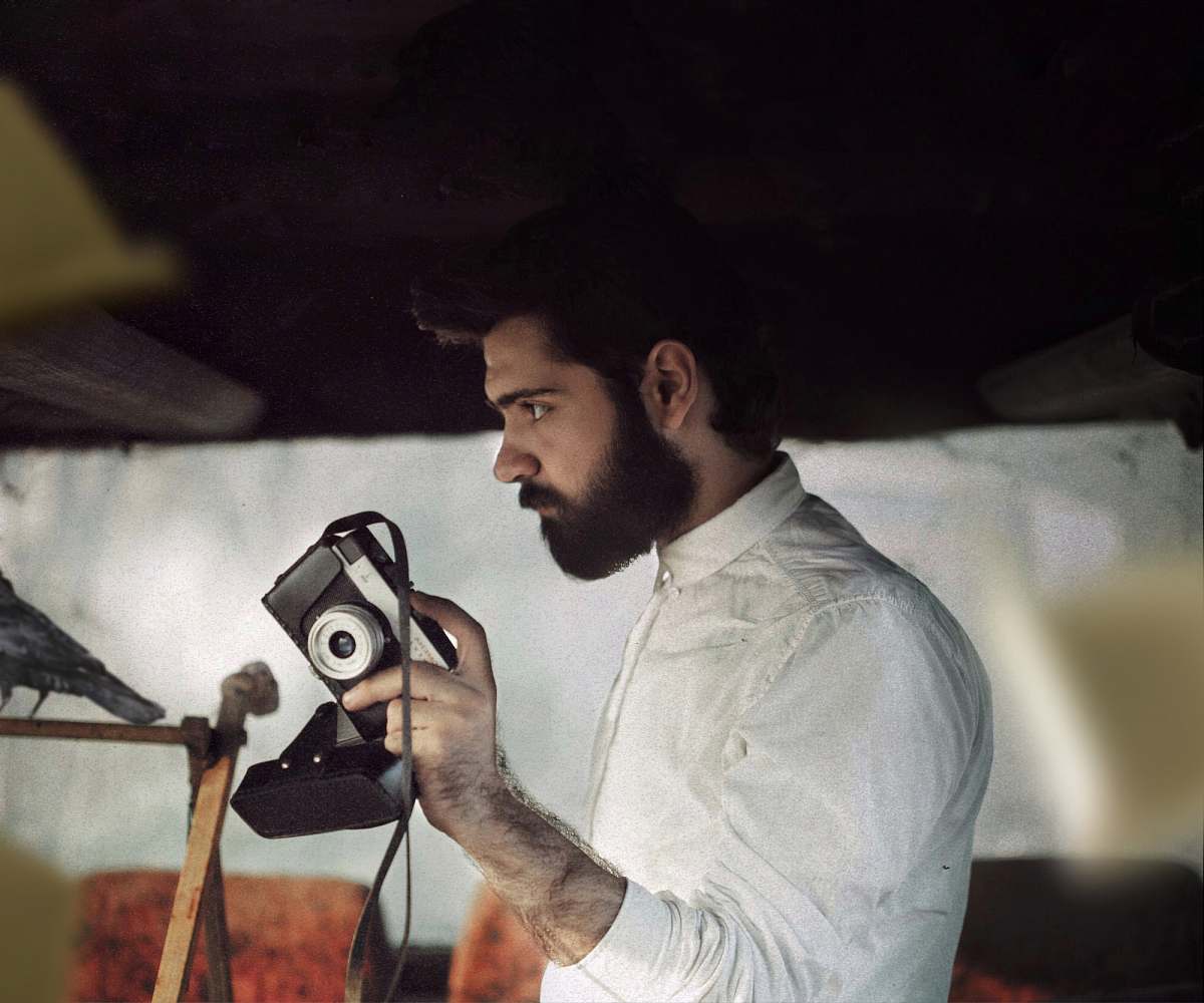 person person holding camera human