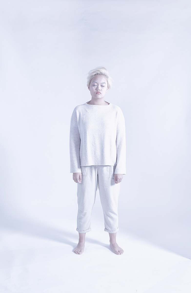 human person wearing white long-sleeved shirt person