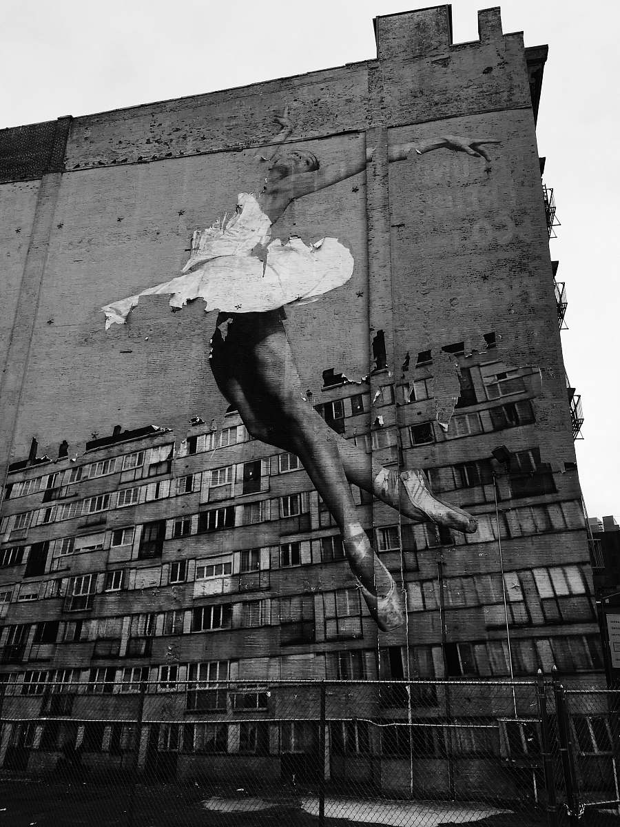 human ballerina in white dress mural black-and-white