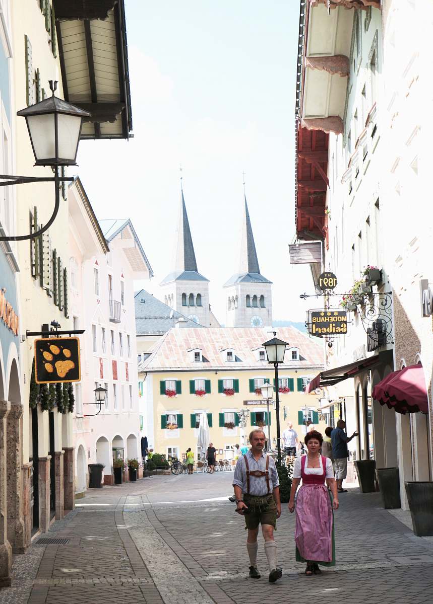 human city buildings during daytime people