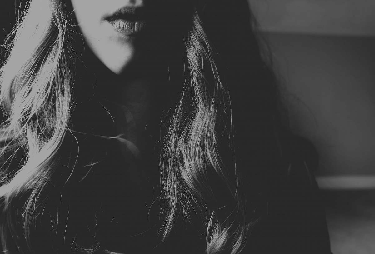 black-and-white grayscale photography of woman's face lips