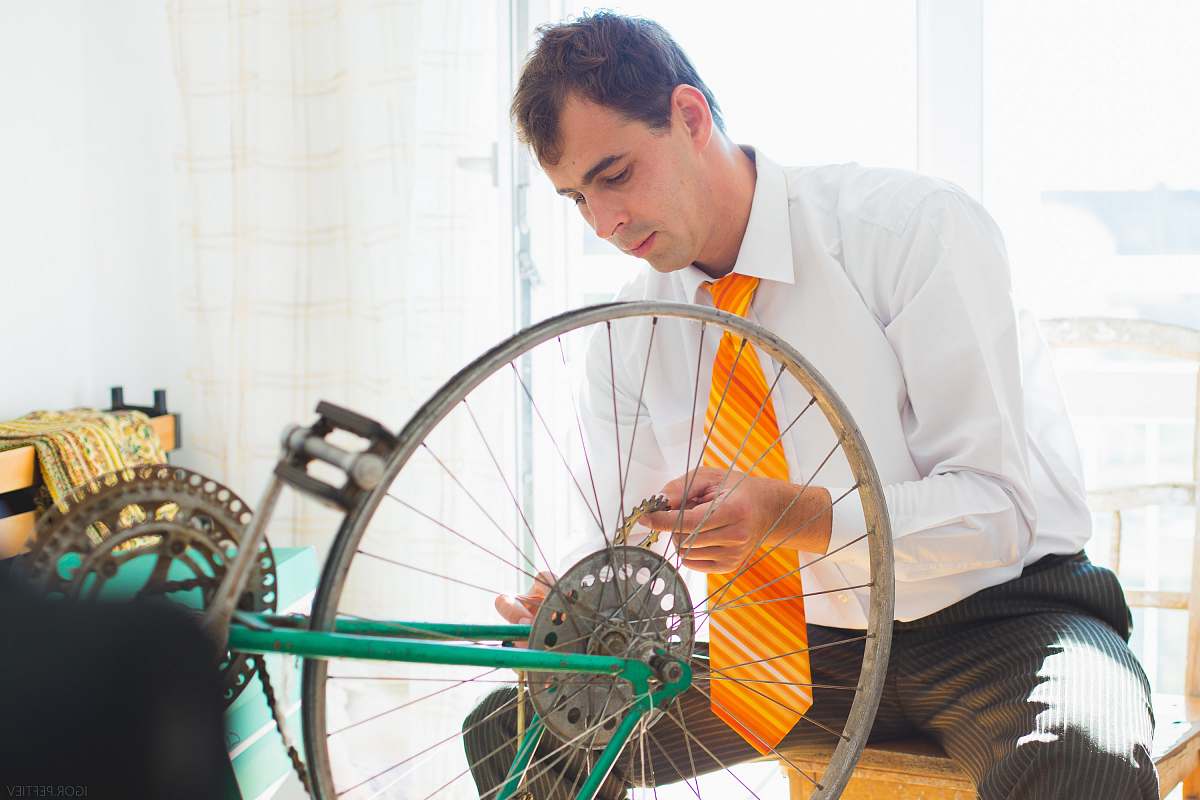 human man holding sprocket people