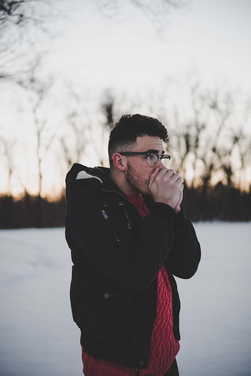 human man placing his hands on his mouth people