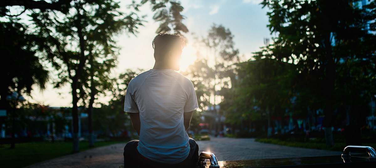 people man sitting on road human