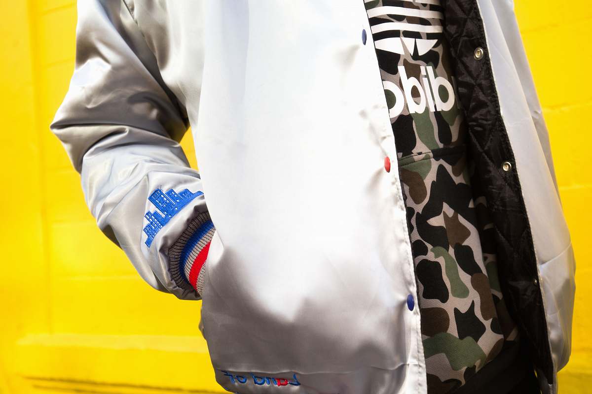 people person in white jacket with hands in pocket human