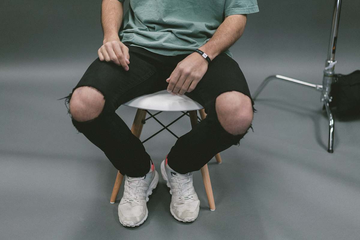 people person sitting on white wooden stool human