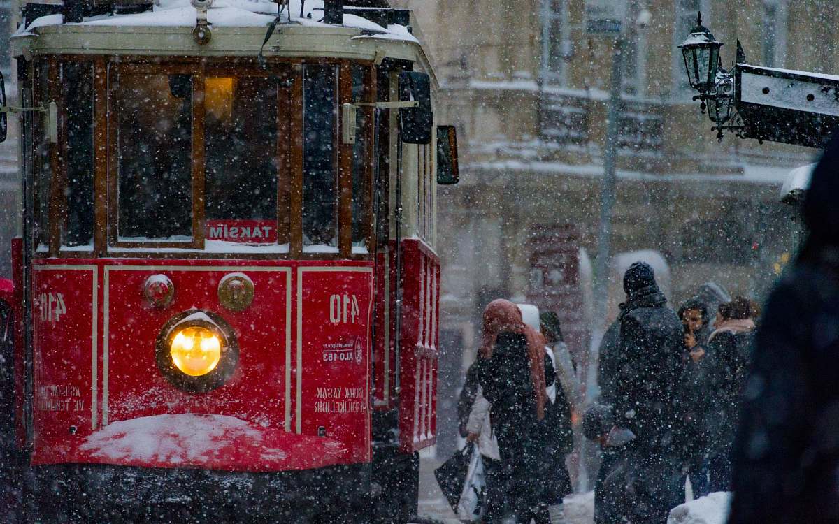 istanbul photo of people near tram train turkey