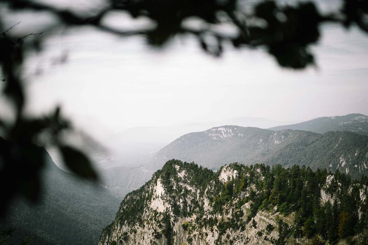 switzerland high angle photography of misty mountain terrain mountain