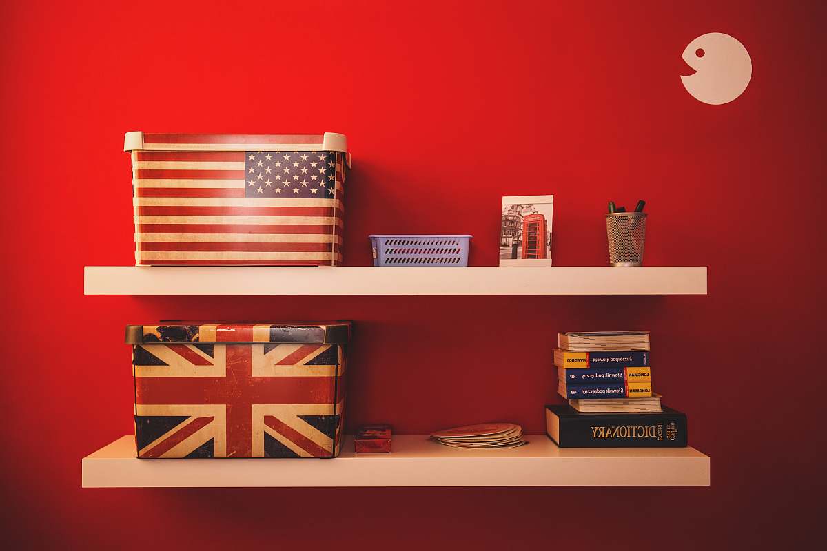 books two gift boxes on floating shelf shelf