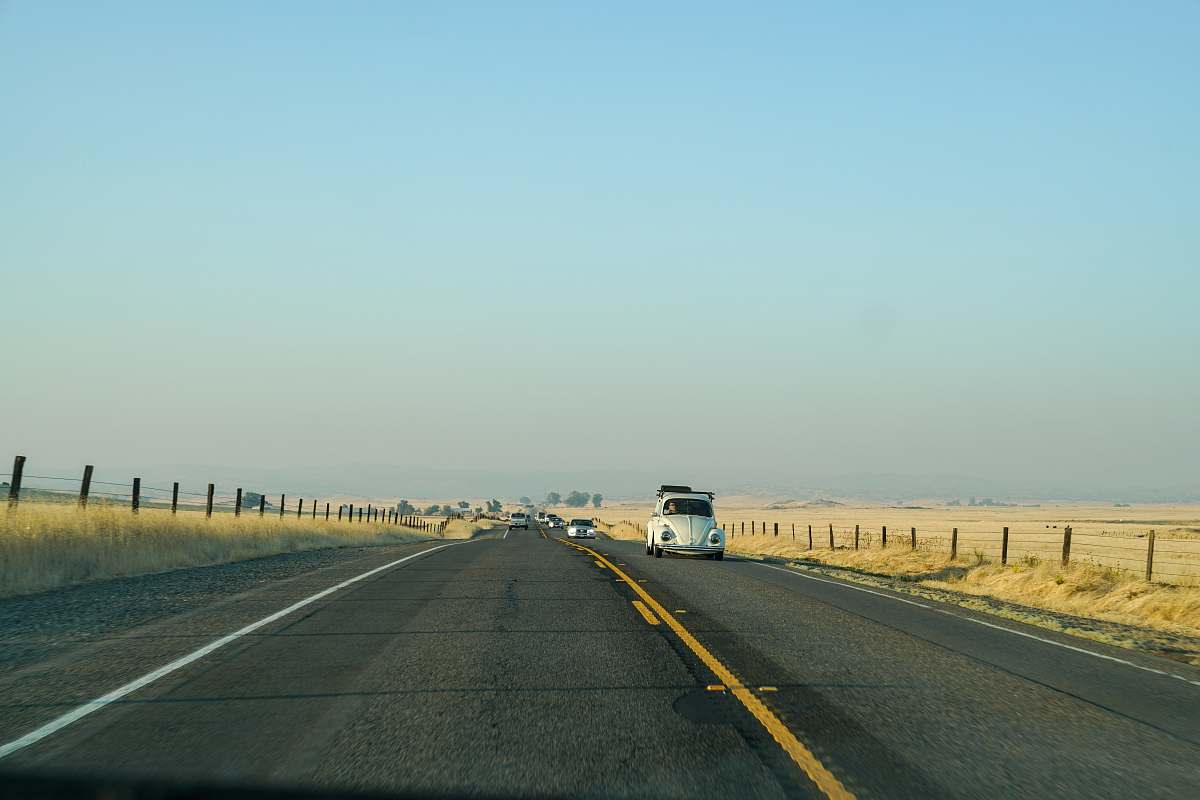 freeway white car on concrete road highway
