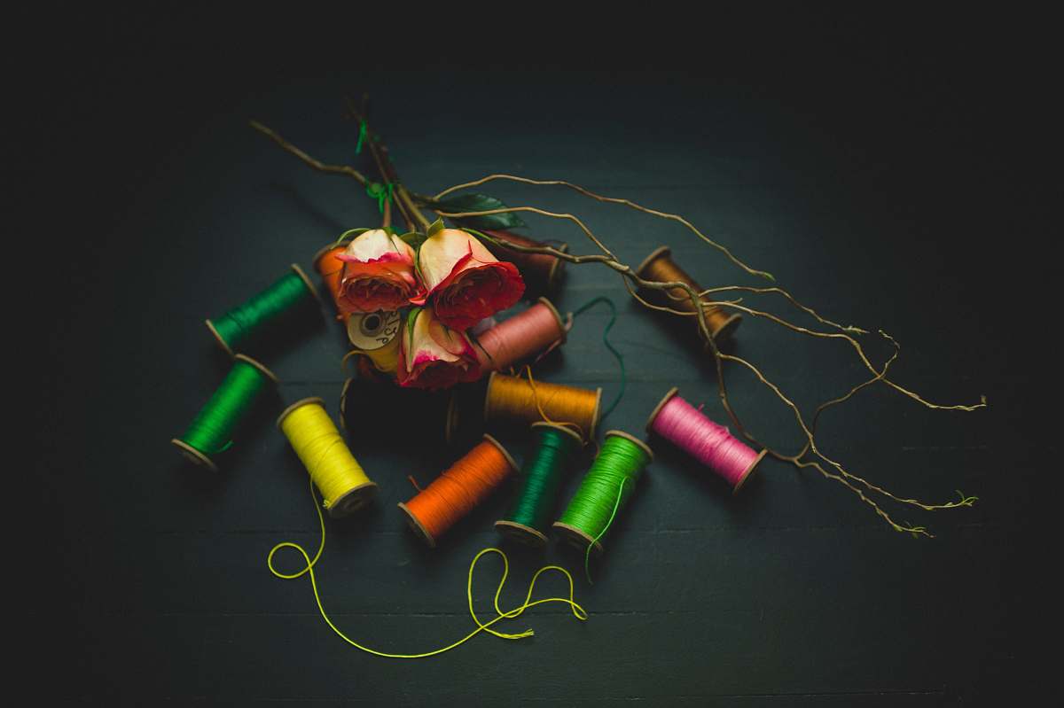 color flat lay photo of threads thread