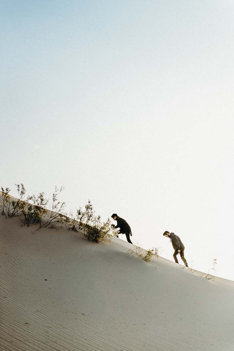 soil two men mountain climbing during dayting outdoors
