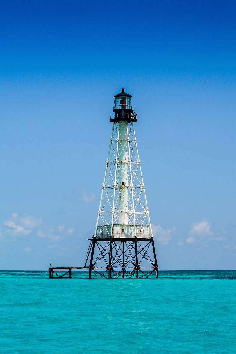 beacon white and black steel tower photography structure
