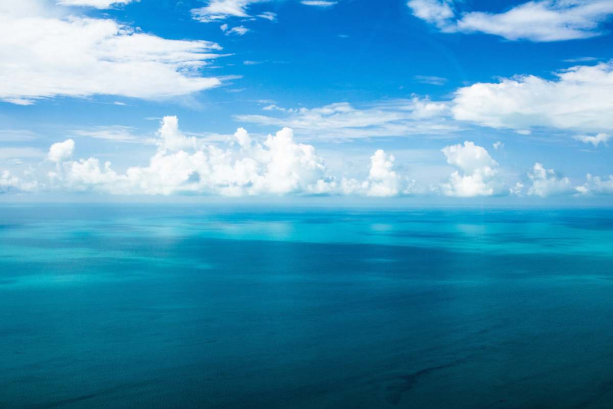 cloud blue ocean under blue cloudy skies nature