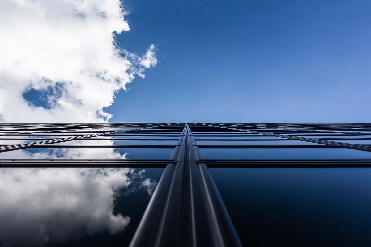 blue worm's-eye view photo of high rise building building