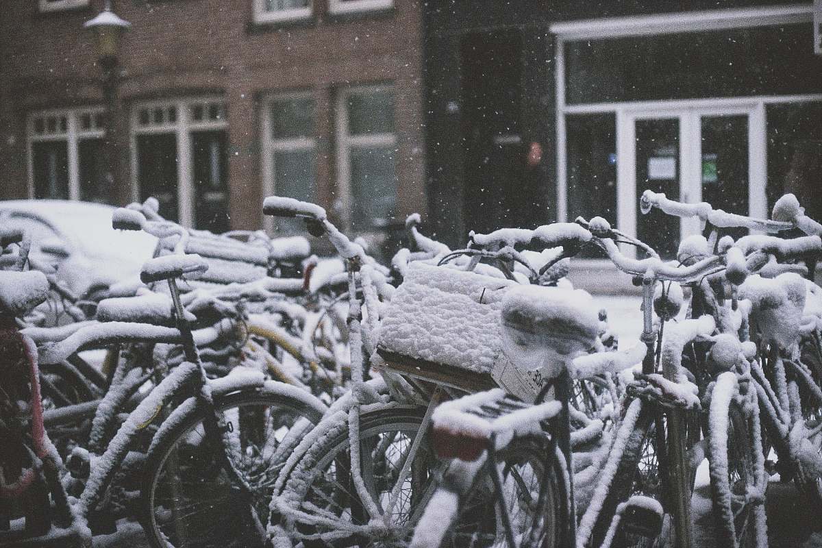 weather bike parked on street covered with snow winter