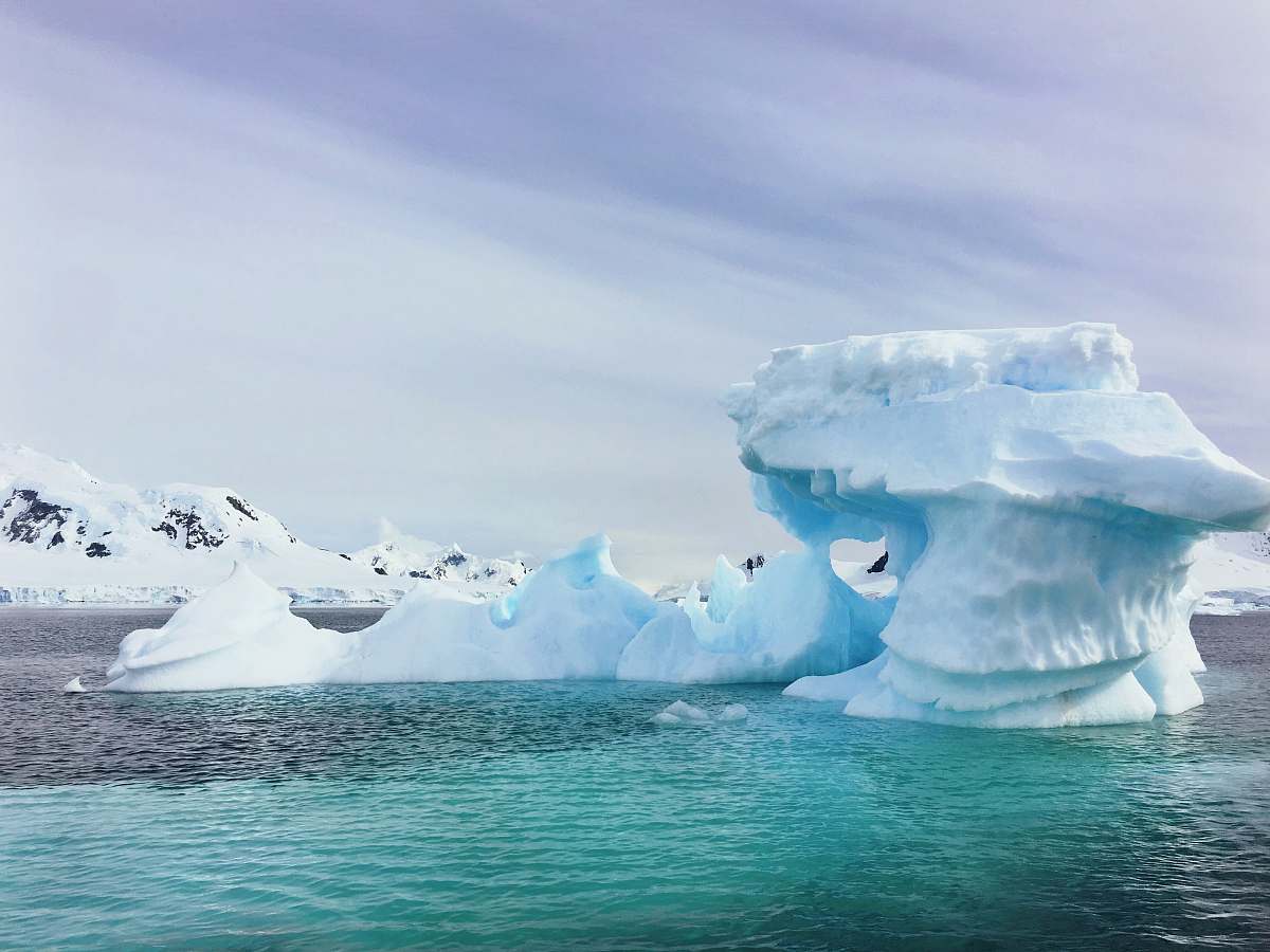iceberg iceberg in middle of ocean ice