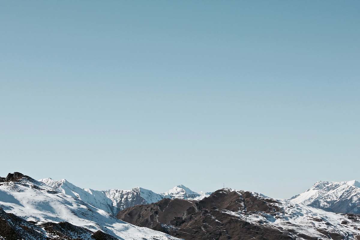 mountain photo of mountain covered by snow during daytime nature