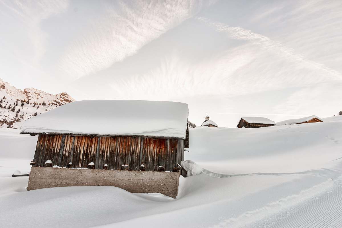 nature photo of shed covered with snow winter