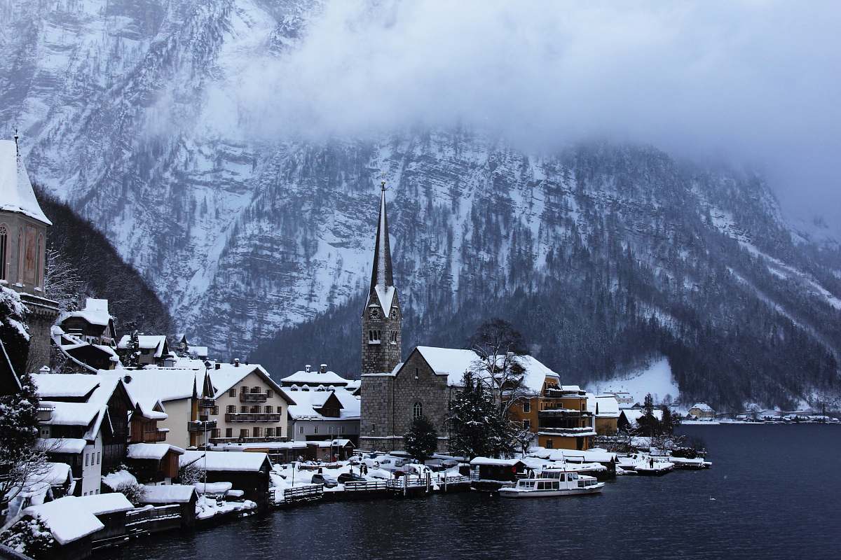 hallstatt village near body of water and moutain austria