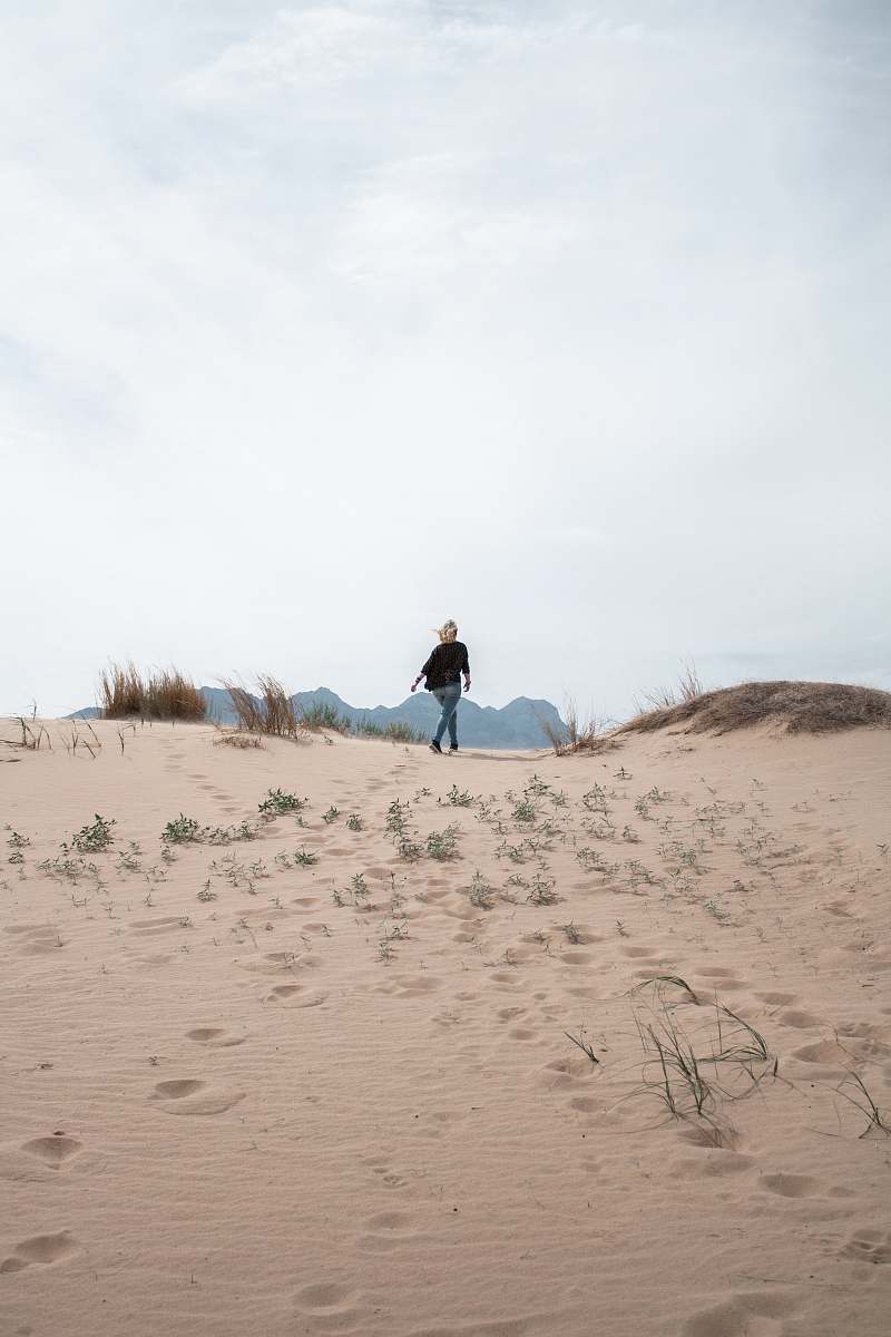 sand woman walking on sand nature