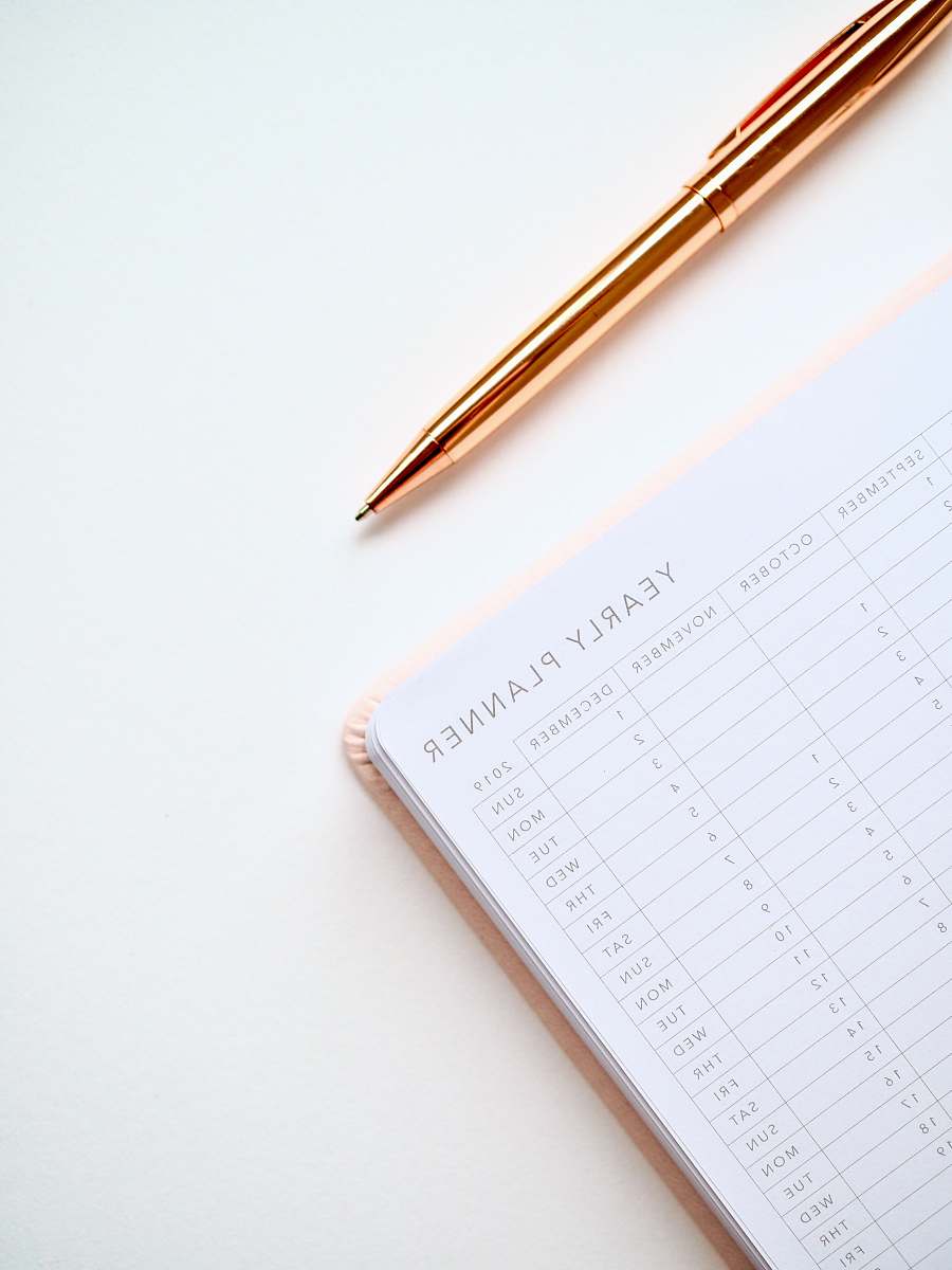 pen white and black yearly planner notebook planner