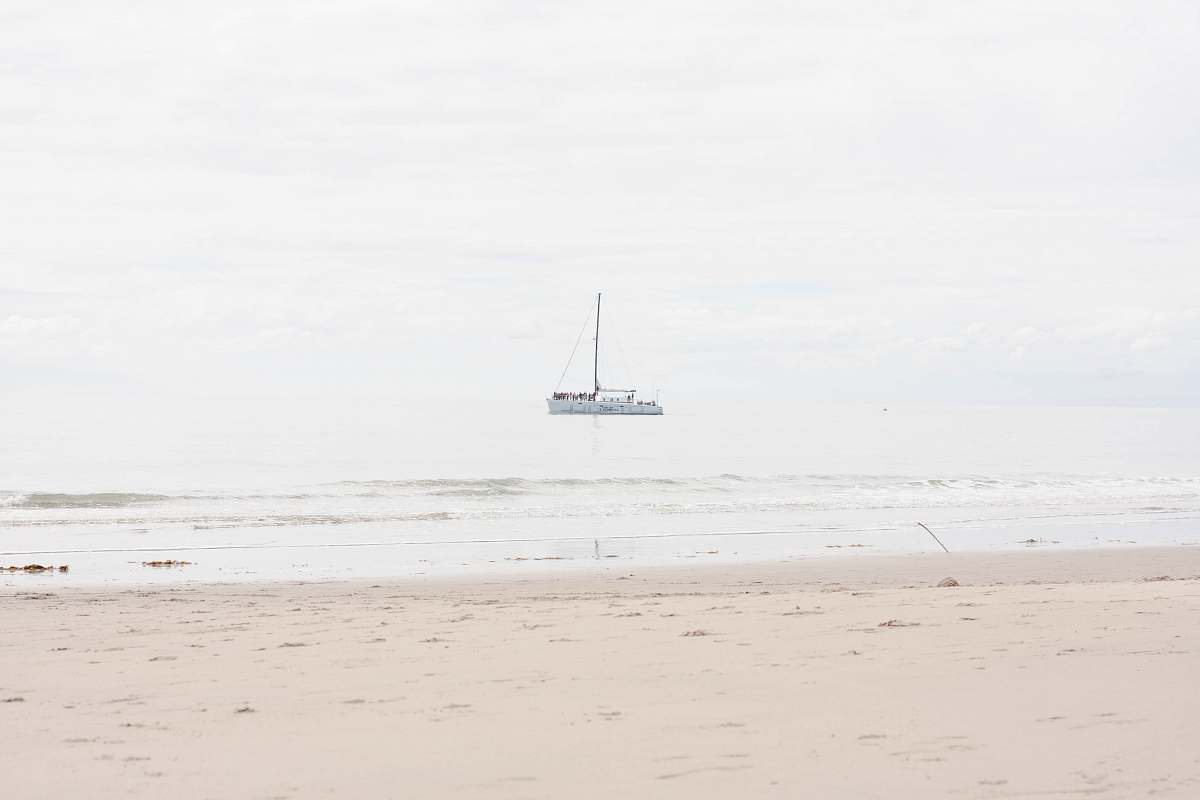 boat boat near shore during daytime vehicle