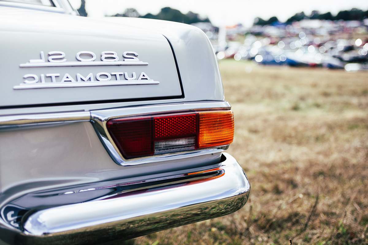 car tilt shift lens photo of 280 SL automatic car bumper