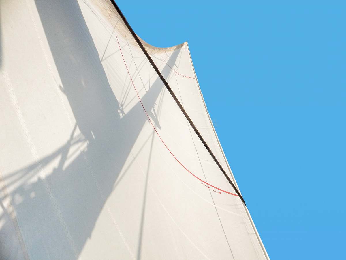 boat white building in low-angle photography sailboat