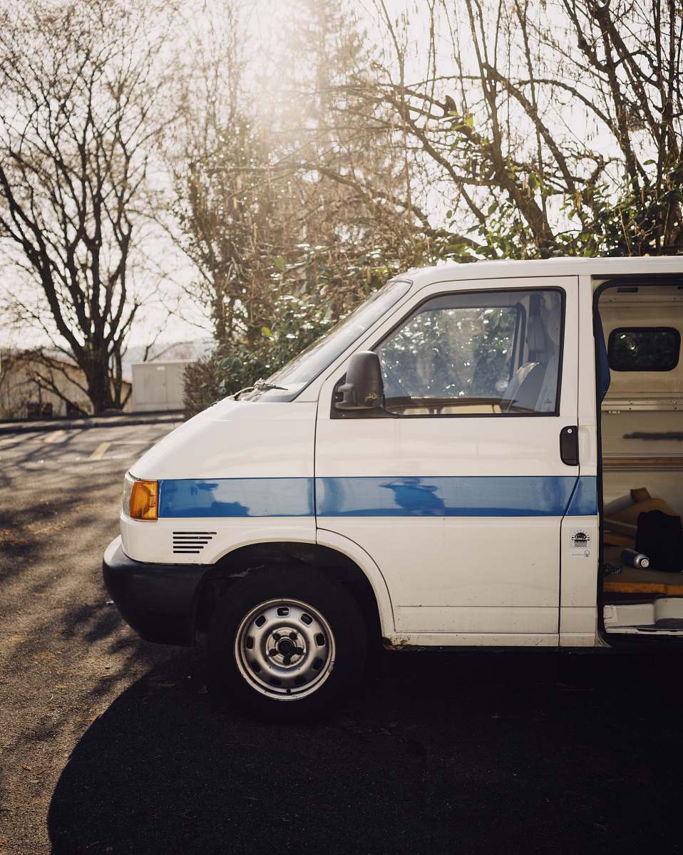 transportation white vehicle parked at street vehicle