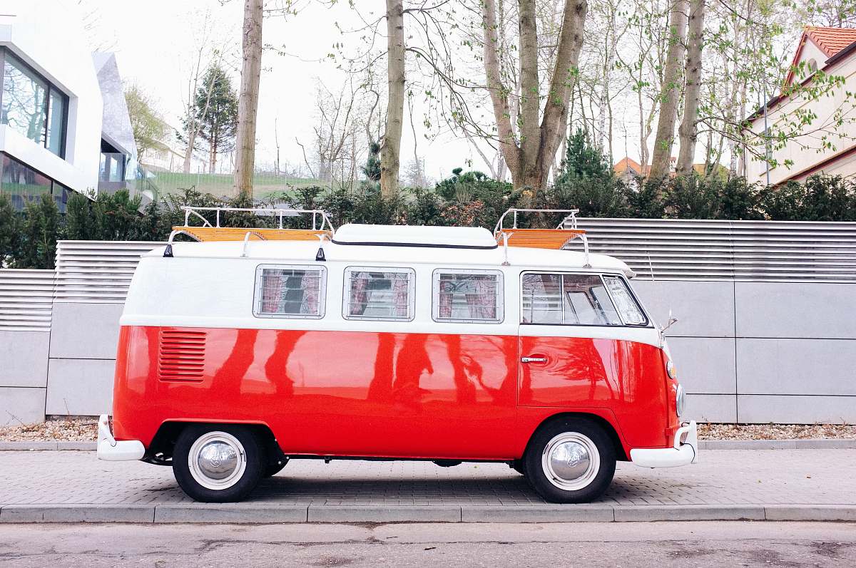 van red and white van at the road red