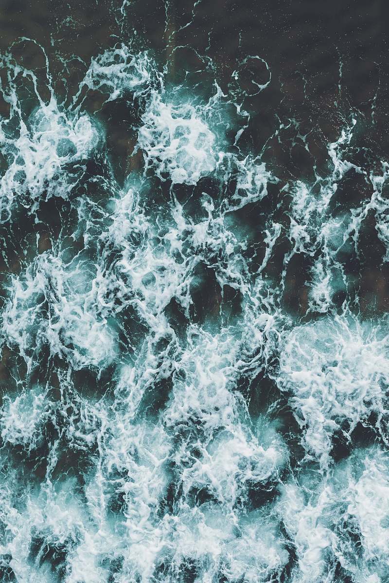 sea aerial photo of body of water ocean