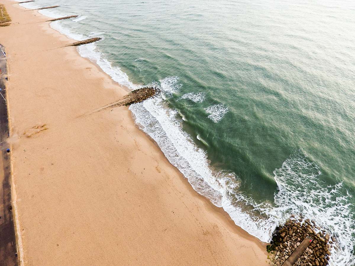 sea aerial view photography of beach during day coast