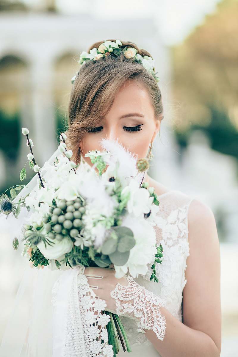 human bride smelling the flowers people