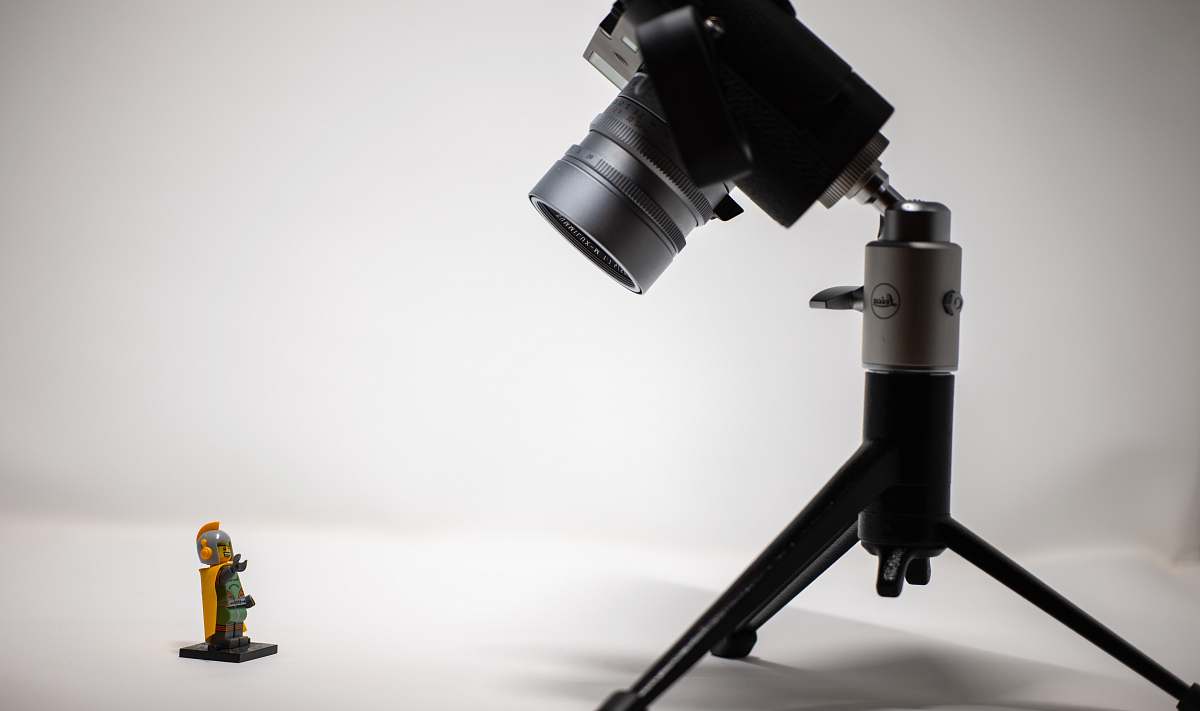 tripod black camera with tripod stand electronics