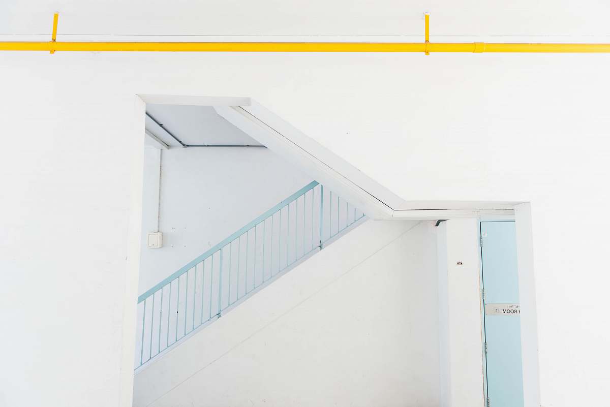blue blue upstairs inside white painted wall stairway