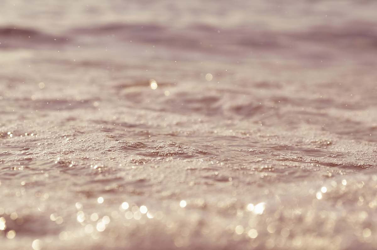 rain Close-up of raindrops falling on a body of water water