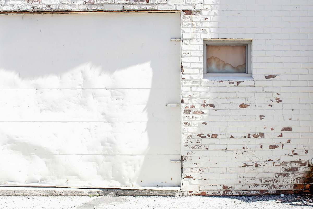 door closes white garage door garage door