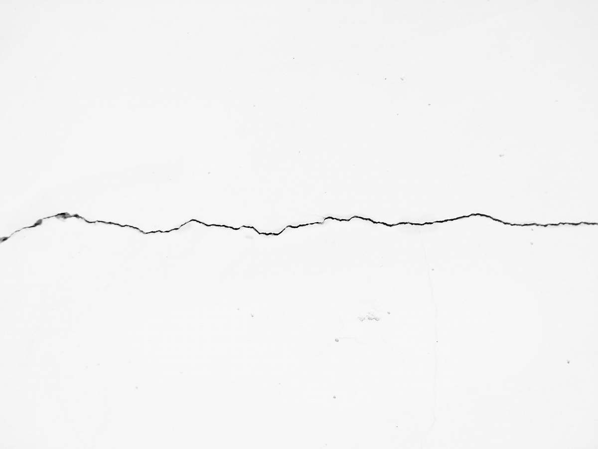 black-and-white crack on surface drawing