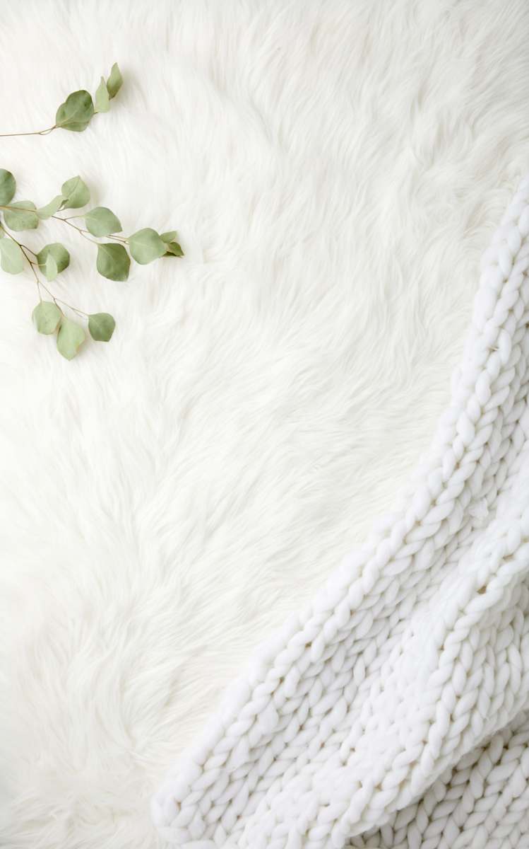 blanket green leaves on white textile rug