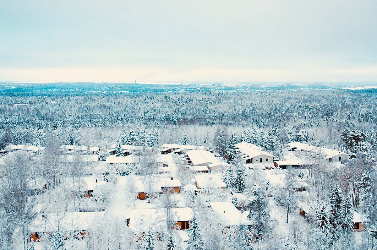 snow houses covered with snow during daytime roof