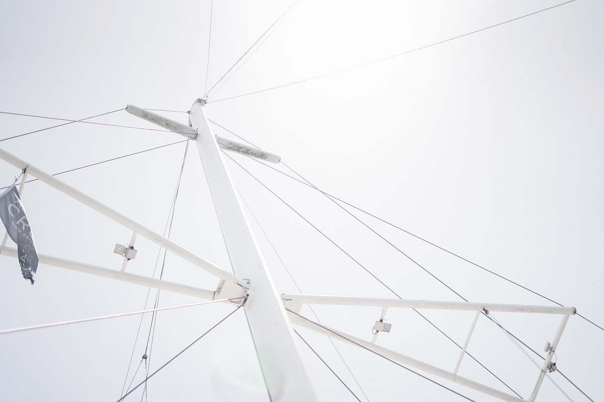 antenna low-angle photography of white metal tower electrical device