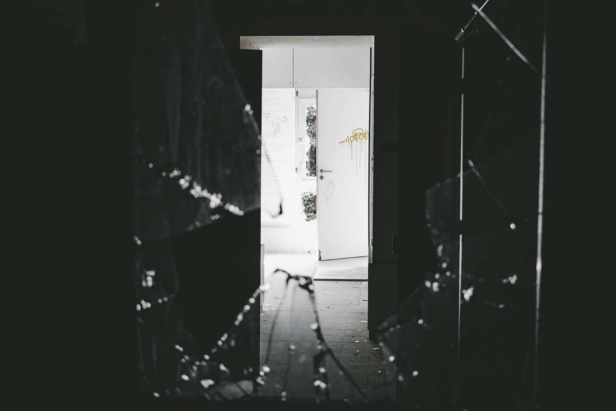 black-and-white opened white wooden door studio