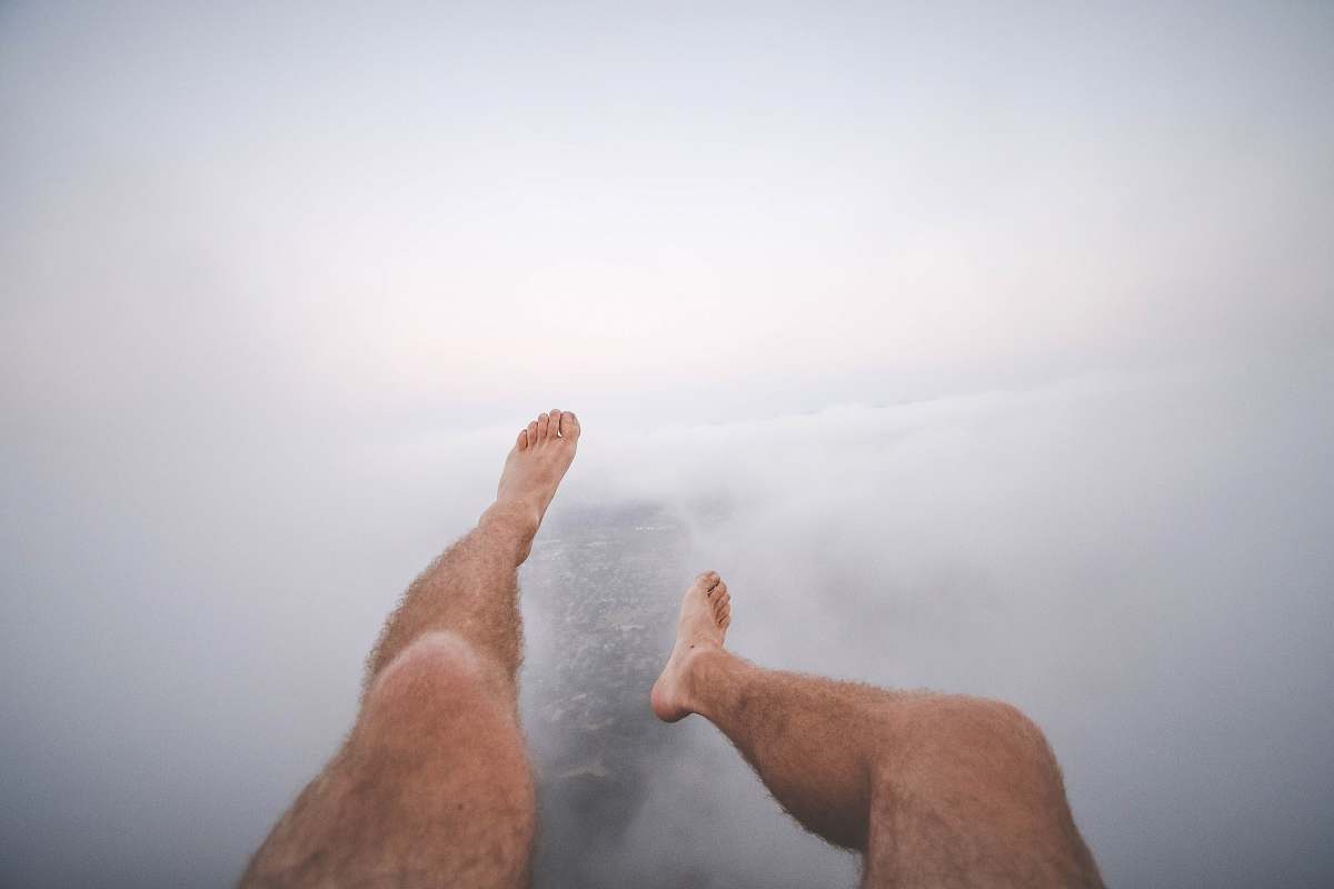 clouds person's foot man