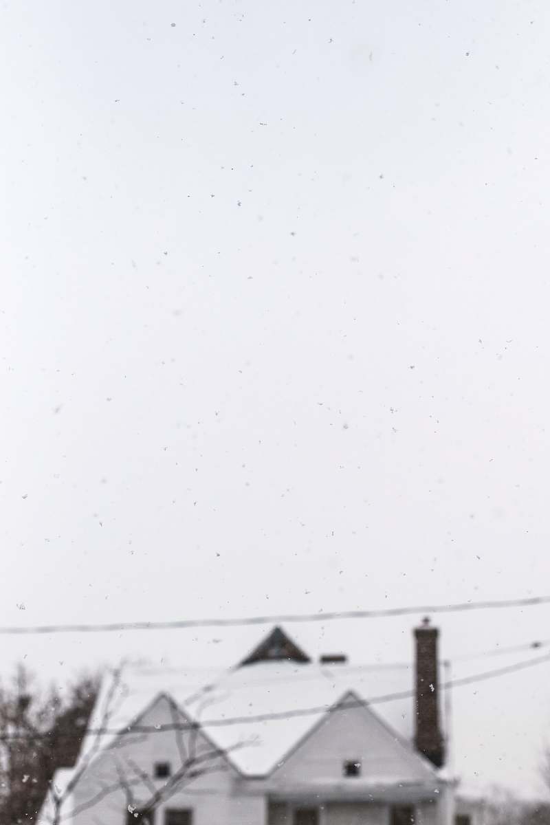 black-and-white snow covered house grey