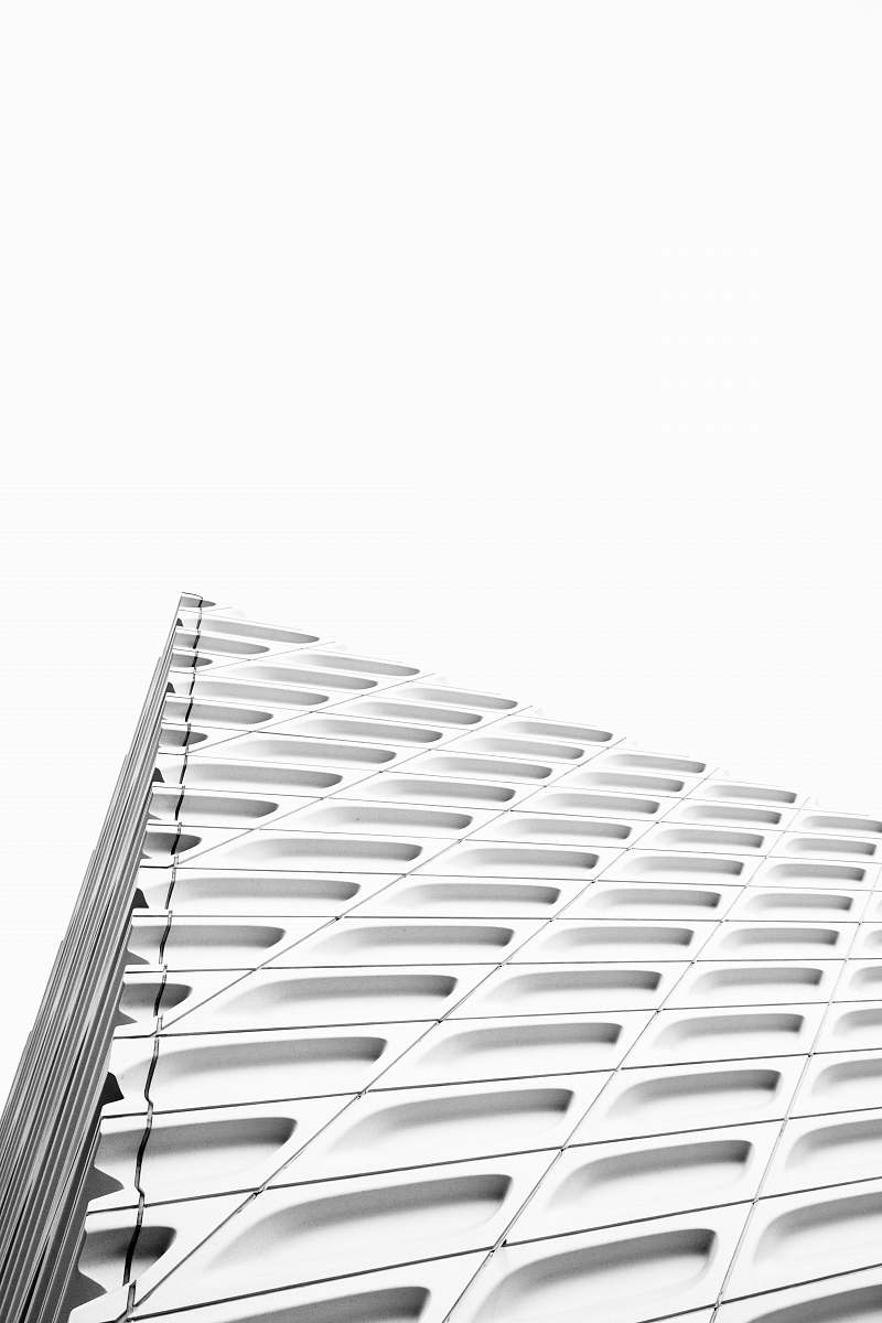 black-and-white white concrete building low angle photography the broad