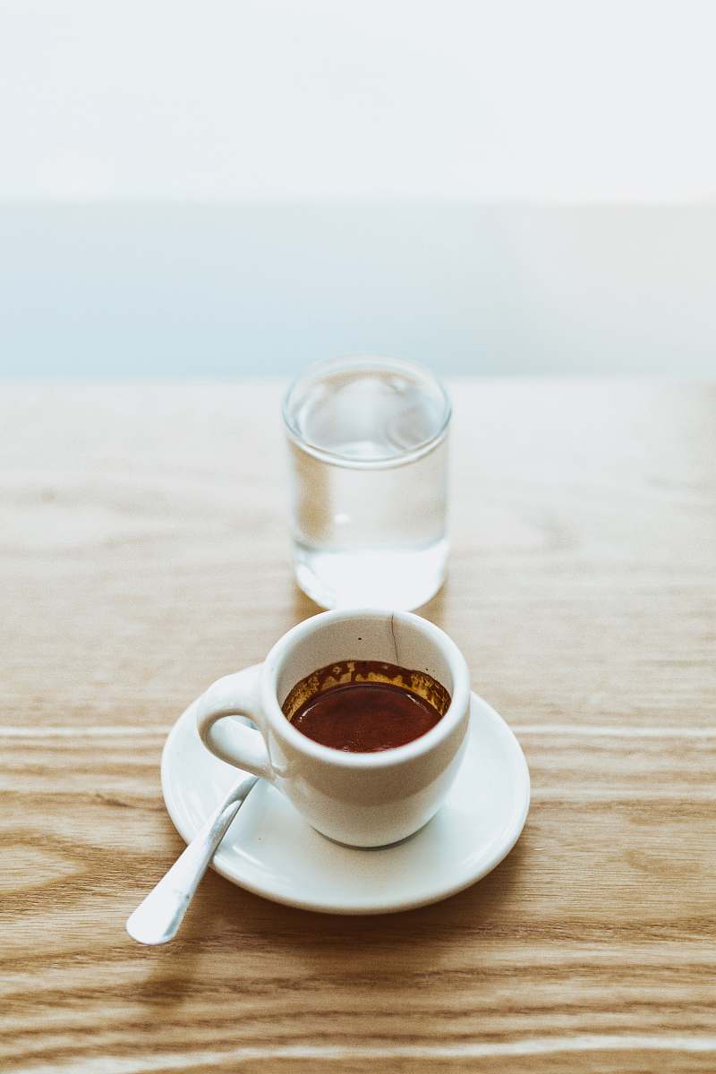 cup white cup with chocolate drink inside coffee cup