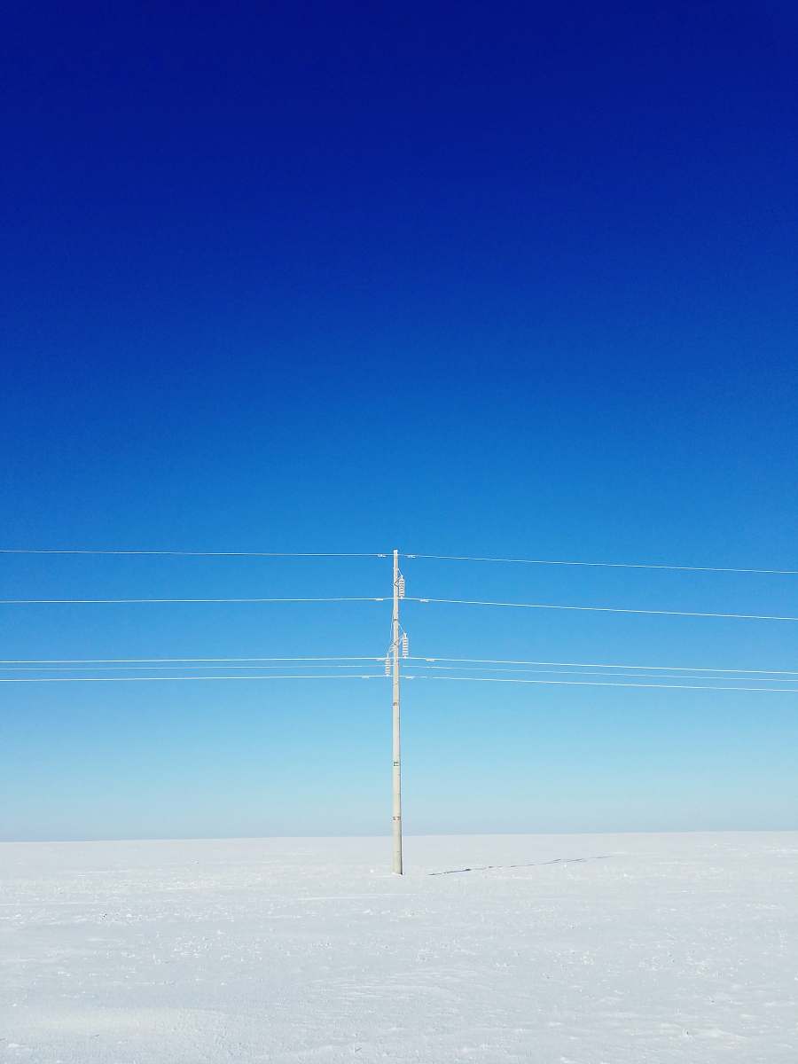 landscape white electric post blue