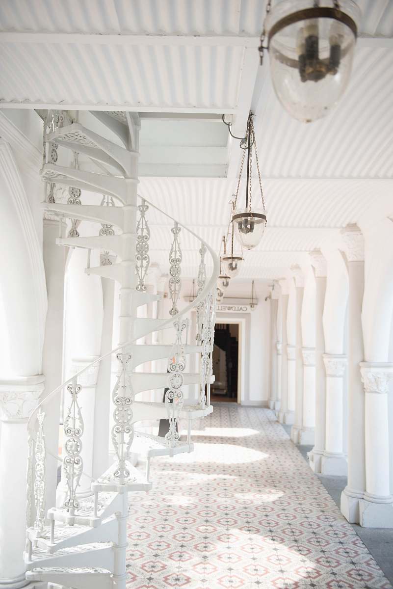 corridor white hallway with ladder room