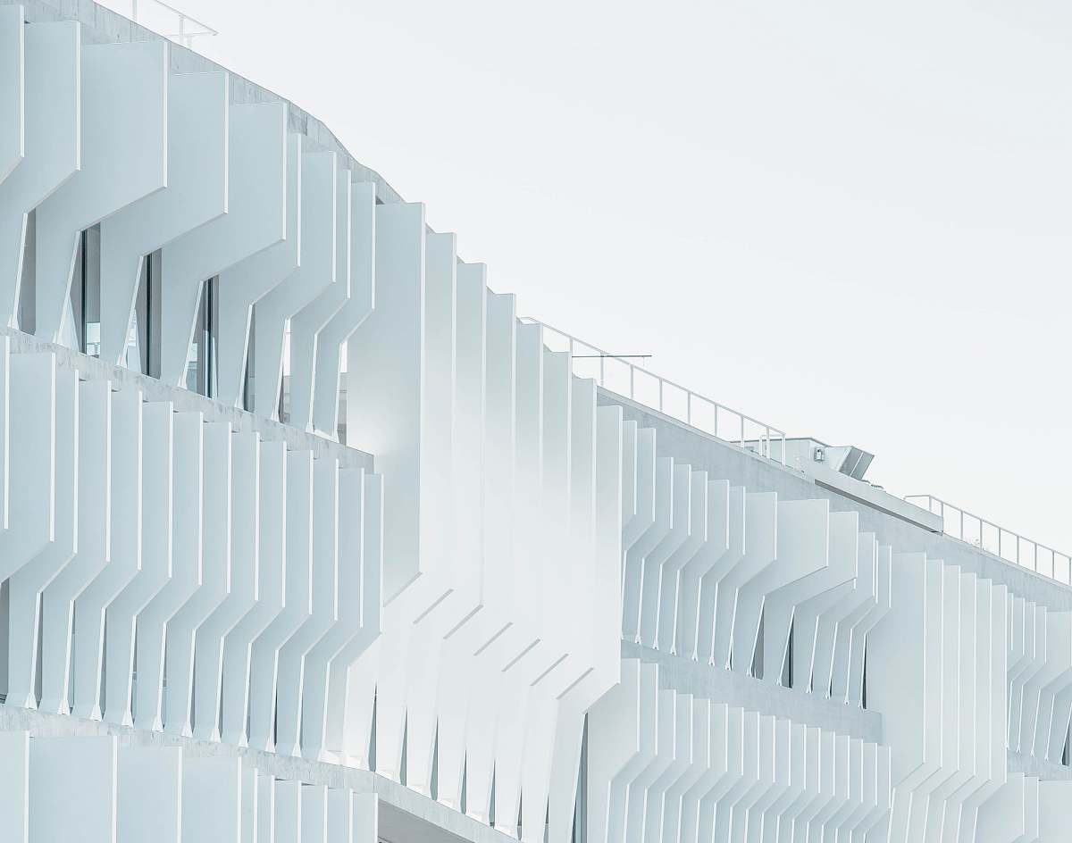 building white high-rise building over cloudy sky at daytime architecture